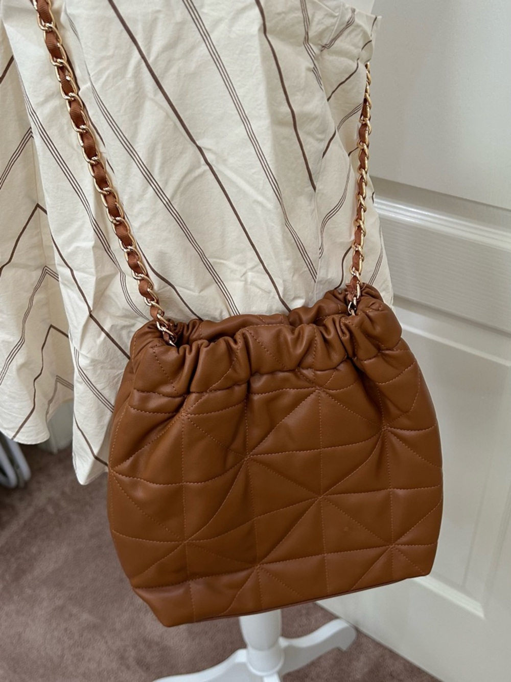 Quilted Chained Drawstring Shoulder Bag